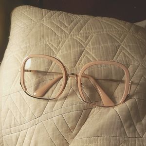 Oversized fashion/character glasses, clear frame